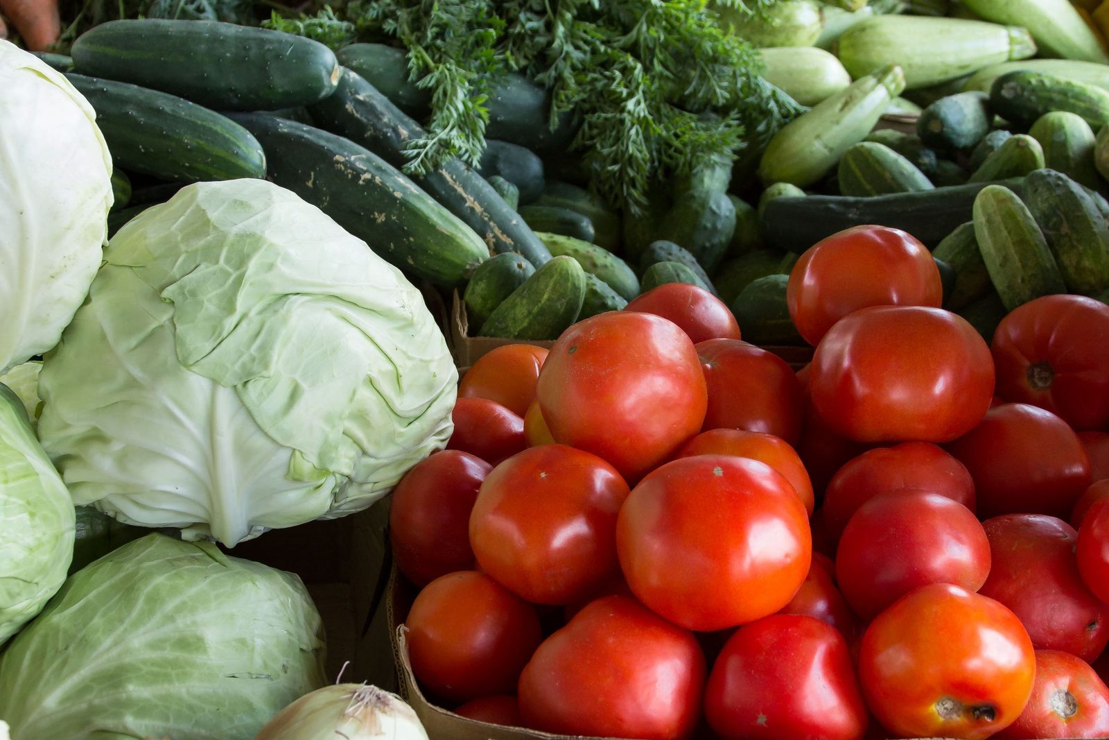 Produce crates at a market stand. Honor Box.