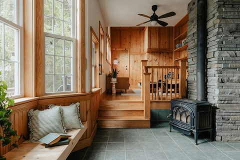 Option F thumbnail: lodge den with woodstove and seating