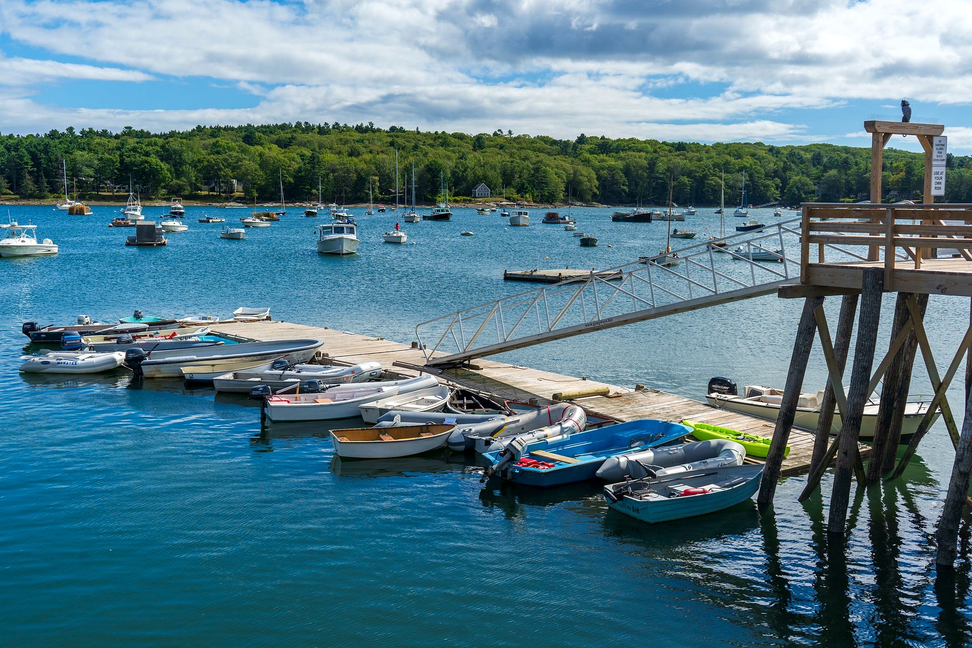 Deep Cleat Marina. Slips and docks under bright sky.